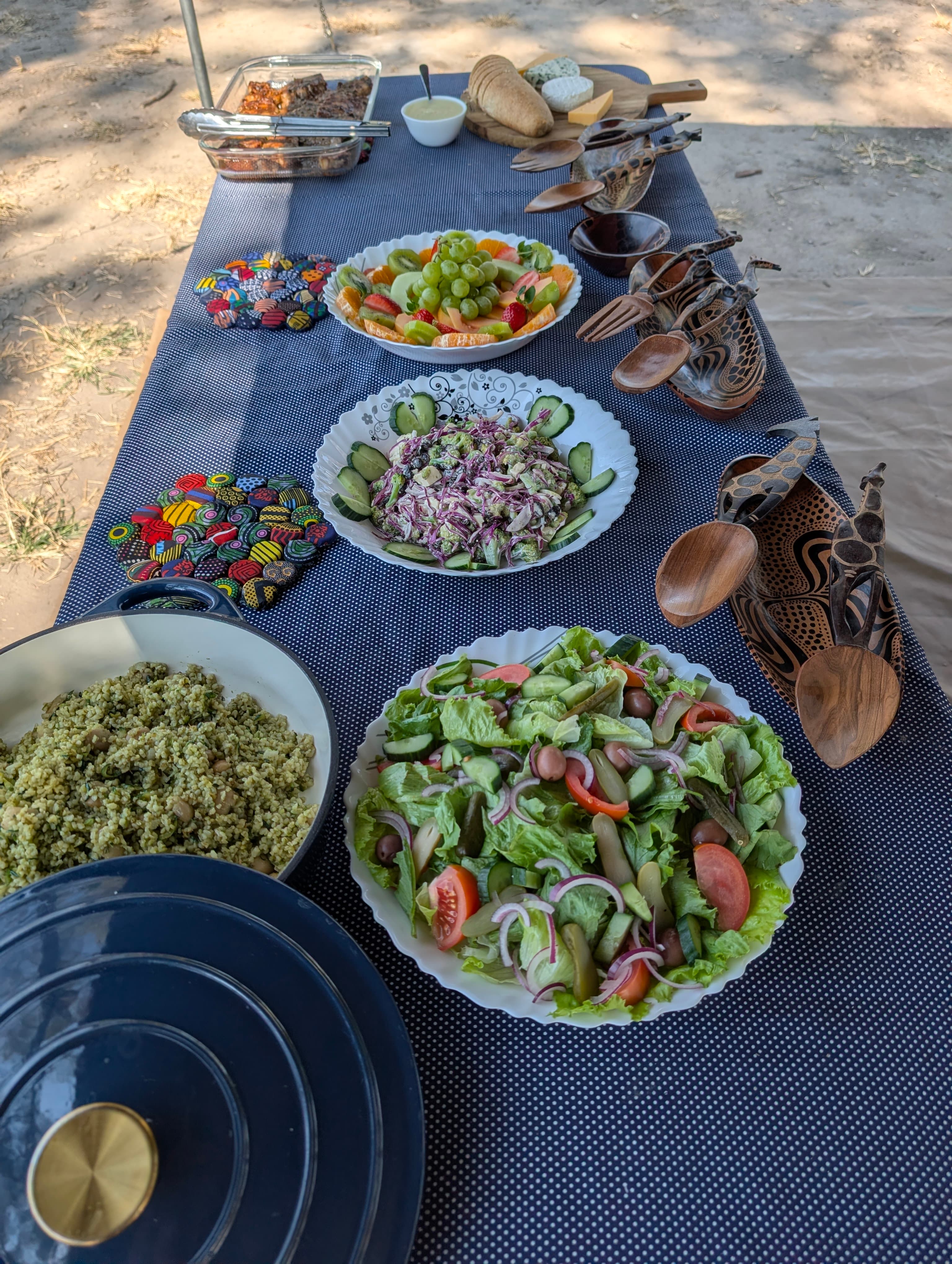 Camp dinner in the Botswana wilderness at sunset
